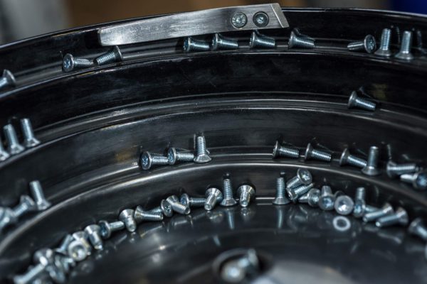 Bowl feeder unit with screws being sorted, manufactured by Sandfield Engineering